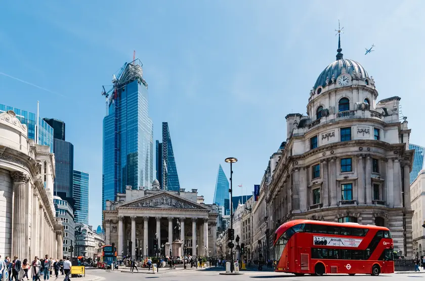 a red bus in a city