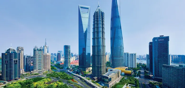 a group of tall buildings in a city