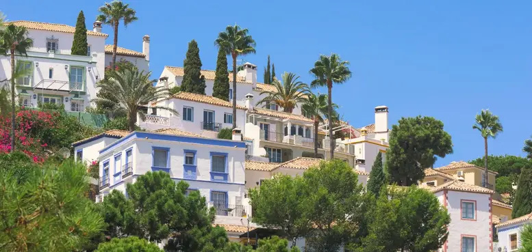 a group of buildings with trees