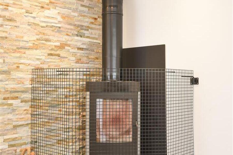 A WOOD BURNER PORT.J