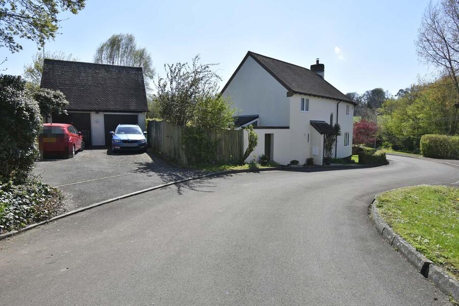 A HOUSE AND GARAGE.J