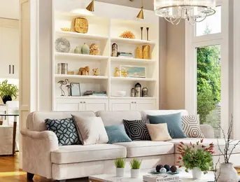 a living room with a couch and shelves