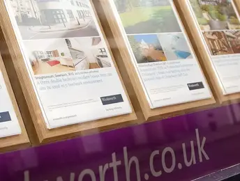 a group of posters on a wall