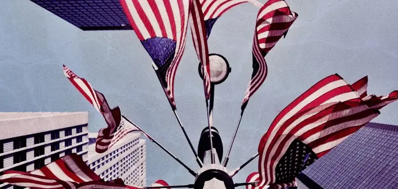 a group of flags flying in the air