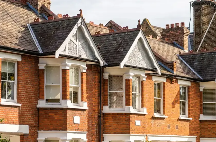 a brick building with a chimney
