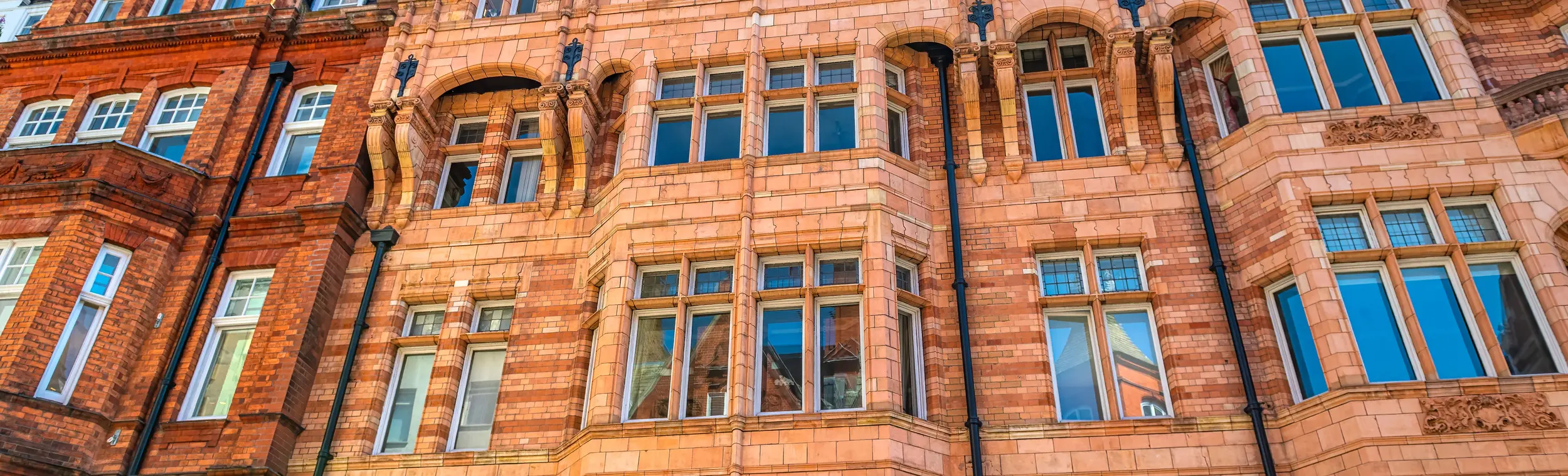 a brick building with many windows