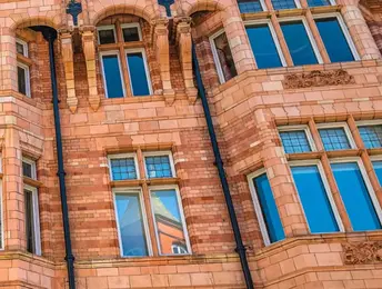 a brick building with many windows