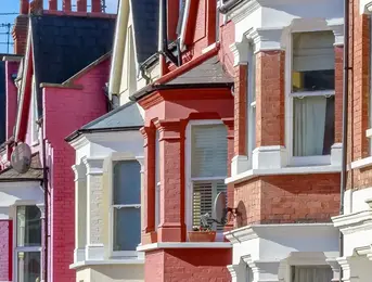 a row of buildings with windows