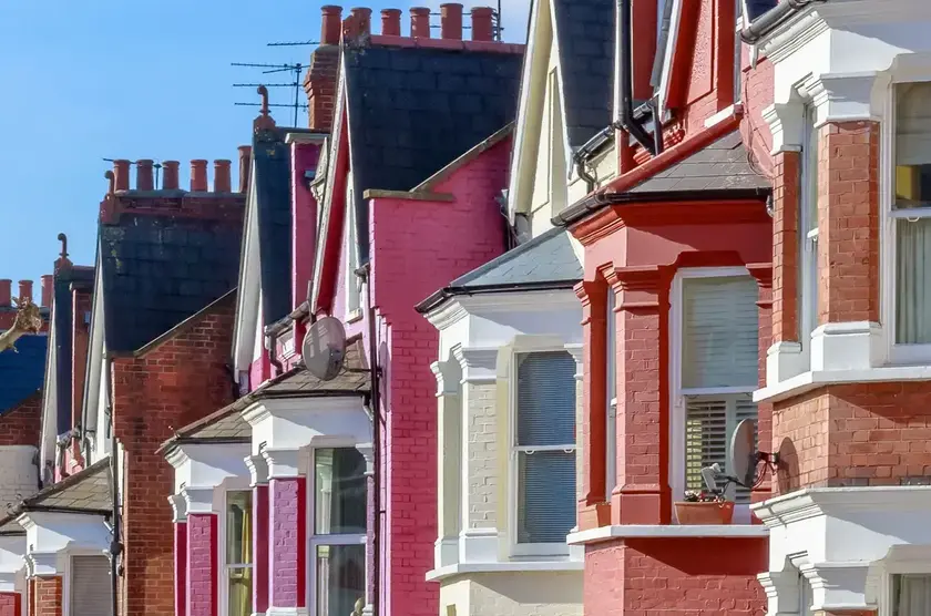 a row of buildings with windows