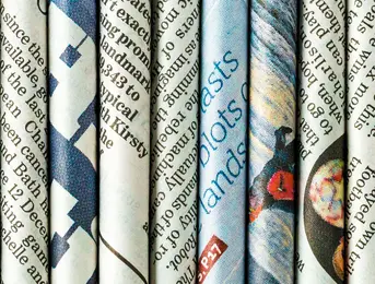 a close up of newspapers