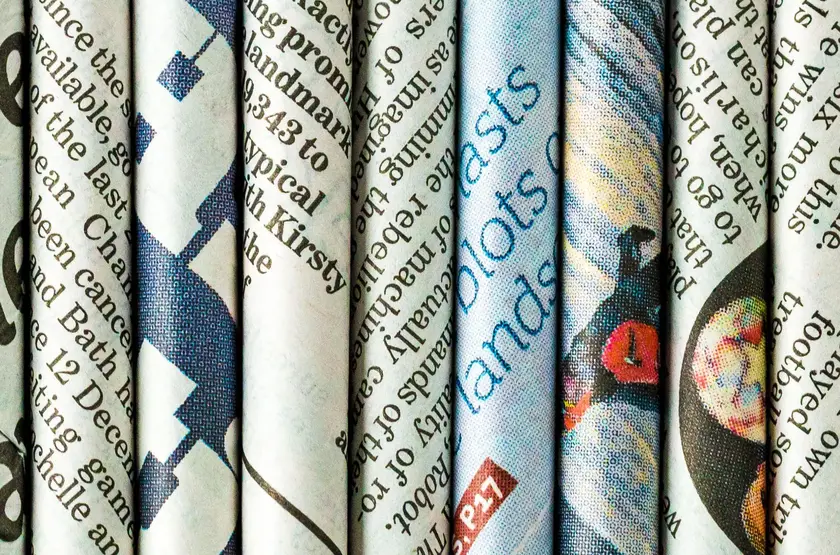 a close up of newspapers