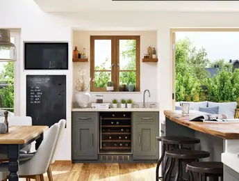 a kitchen with a table and chairs